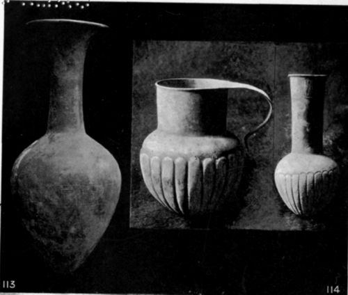 114. Bronze fluted vase