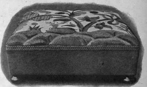 Footstool of Jacobean pattern. Hunting scene in coloured wools on linen, 18 inches square