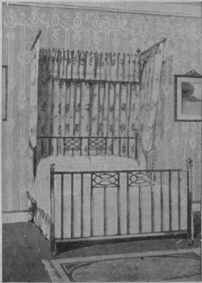 Fig. I. A bedstead in the Italian style, with a straight back and curtains hung on rings, is both pretty and hygienic