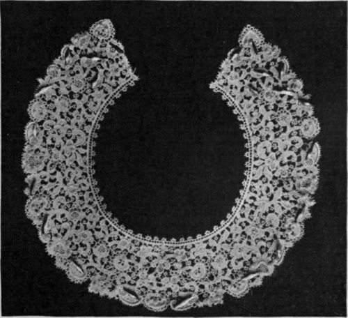 Guipure lace collar on which oat shaped beads are sewn as a border