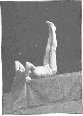 Exercise No. 13. Reclining, hands grasping something back of bead, raising both feet to vertical position