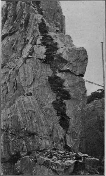 Plicated limestone, with sheet of igneous rock, near Rockland, Maine.