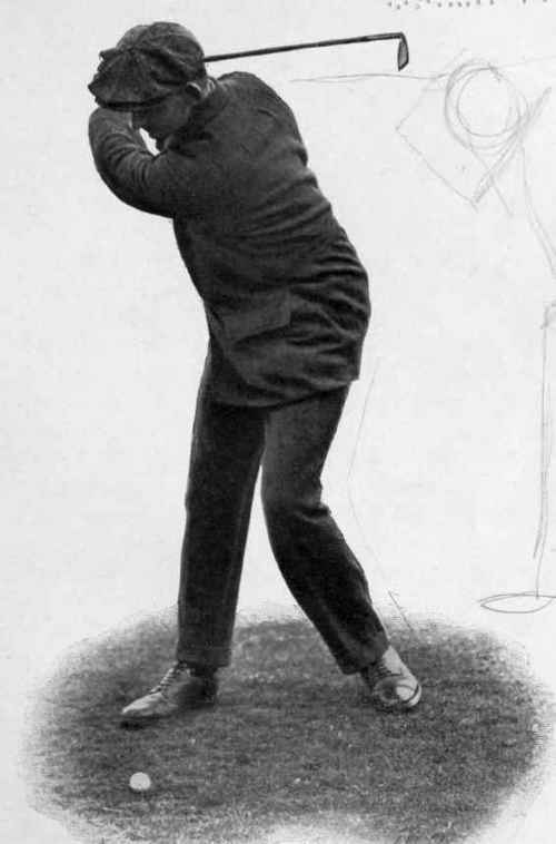 FULL SHOT WITH MASHIE IRON: TOP OF SWING