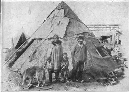 Eskimo family and malamute At Home.