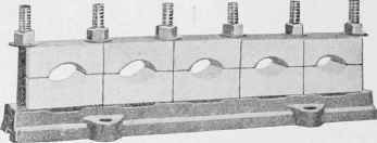 Fig. 22. Iron Rack and Insulators for Large Conductors. Courtesy of General Electric Co., Schenectady, N. Y.