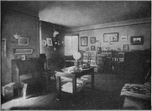 A LIVING ROOM AND LIBRARY COMBINED. View Looking Towards the Fireplace, Plan No. 5, Page 70.