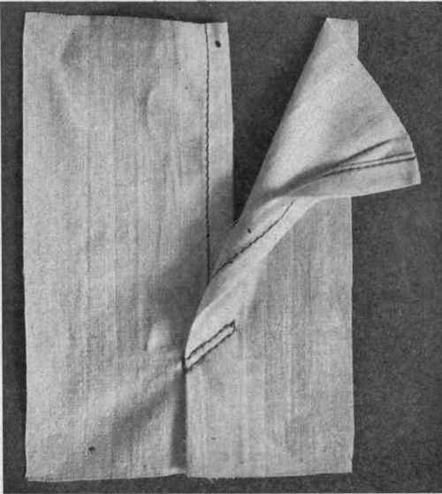Fig. 136.   Narrow hems used for petticoat placket.