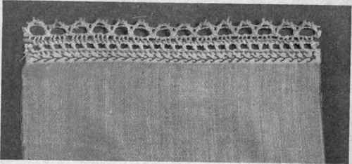 Fig. 147.   French hem, lace edge overhanded to hem, and hem featherstitched.