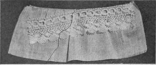 Fig. 151.   Edge of material gathered by rolling and whipping; beading overhanded to rolled edge, and lace overhanded to beading.