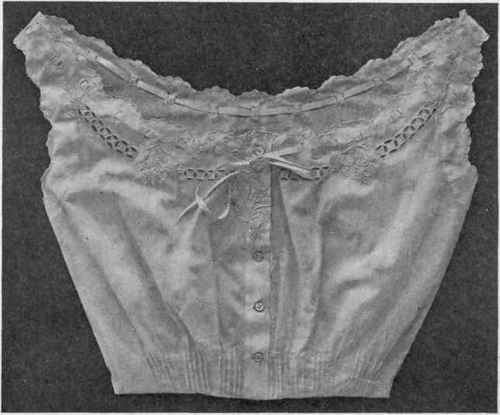 Fig. 163.   French corset cover, hand embroidered eyelets and design.