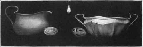 Fig. 101. Silver pitcher and sugar bowl, with forged wire handles.