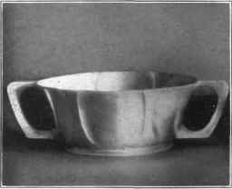 Fig. 108. Silver salad bowl, with two piece handle.