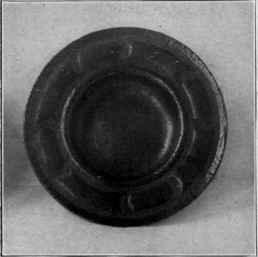 Fig. 129. Chased copper plate, showing an application of the method of beating down the background with the planisher chasing tools.