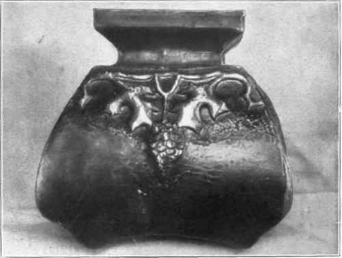 Fig. 133. Chased flower jar, background beaten down. A later stage in the process.