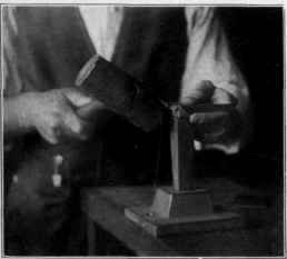 Fig. 17 Bending the desk pad corner. No.l.