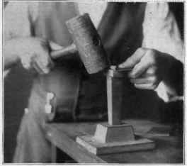 Fig. 18 Bending the desk pad corner. No. 2.