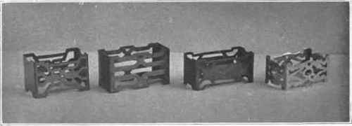 Fig . 32. Saw pierced napkin ring's in copper, brass, and silver.