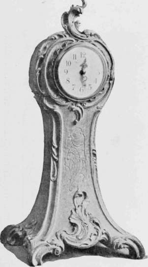 Clock in Louis XV. Style, in Walnut.