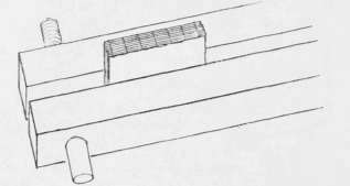 Fig. 6.   Book in position for sawing the back.