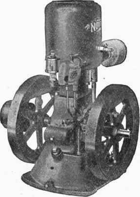 Fig. 181.   Electrical Gas Engine. Notice the two fly wheels and the pulley attached on the left. Power is transmitted from the pulley by means of belting.