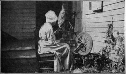 Fig. 49.   Grandmother Allen sat at her flax wheel and showed the girls how to spin.