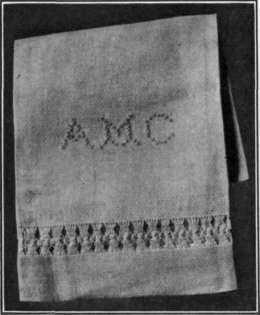 Fig. 88.   A guest towel marked with cross stitch.