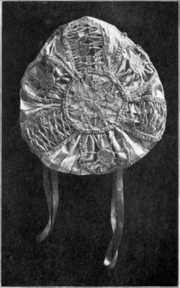 Round Bottom Bag With Raffia Covering.