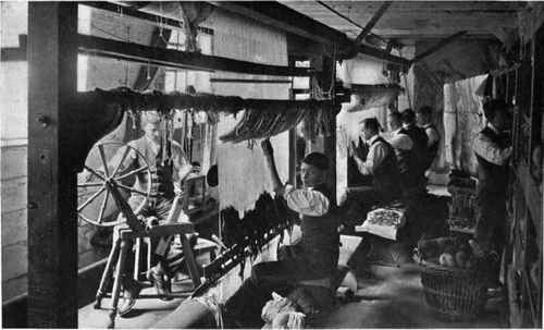 Plate no. 233. Weaving arras tapestries in the works founded by William Morris at Merton in 1881 (See chapter V under Merton).