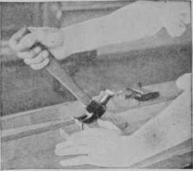 A block under the claws of the hammer is necessary in drawing long nails.