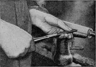 Smooth the cylinder with a square nose turning chisel or a tinner chisel with a long blade.