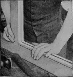 Strips are nailed to the legs to correspond to the grooves in the rails.