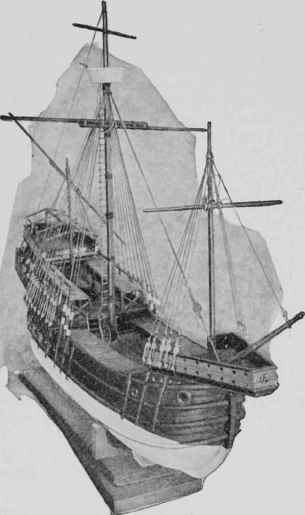 The model partly rigged and with masts, shrouds, yards, main  and forestay in place.