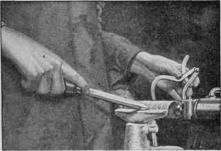 Use a parting tool and calipers. Groove the work to the required diameter at points about