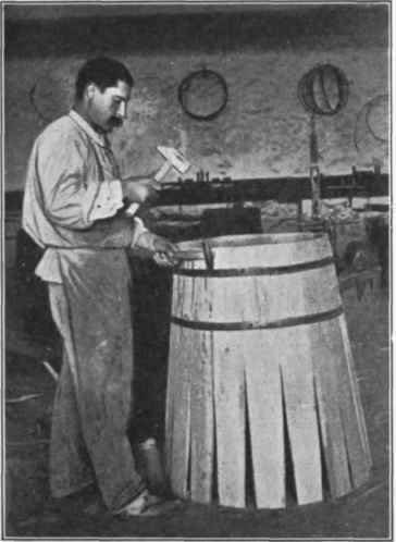 Fig. 31.   Making casks. (Courtesy of Barton and Guestier.)