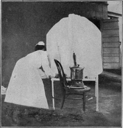 Rear View of Croup Canopy Showing Stove, Kettle, and Tube for Steam