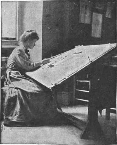 A student at her embroidery frame