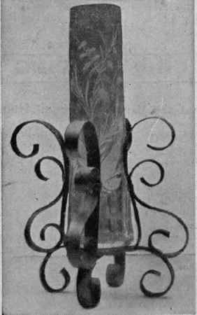 A vase holder clamped with iron