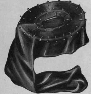 Fig. 6. The inside head mark pinned all round, showing the velvet