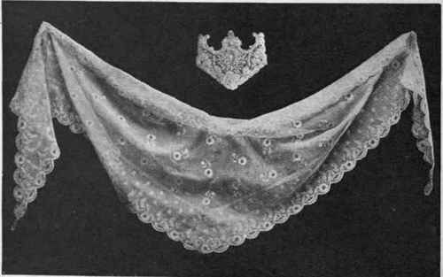 Old English lace scarf of early 19th century work. The Brussels ornament above the scarf is intended to serve as an end for narrow muslin scarf