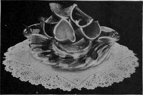 Orange jelly in cases of orange peel A. Ullyett