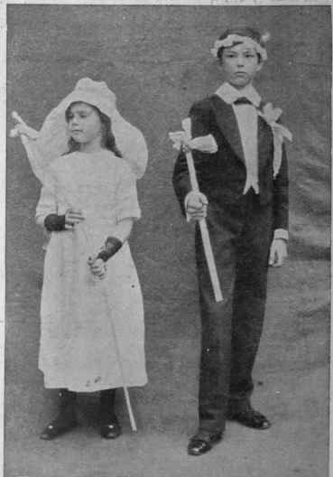 Picturesque and quaint effects can be produced by an ingenious use of the head dresses and other paper decorations found in crackers