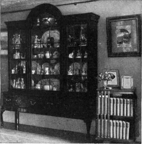 Sheraton cabinet mounted on legs for books or china