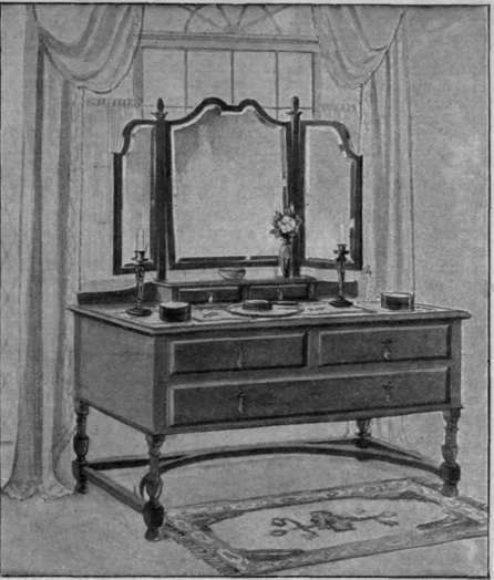 A charming modern dressing table with a triptych mirror