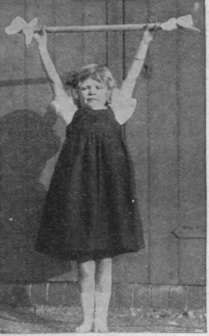A ribbon decked wand used in arm exercises will delight and interest a child