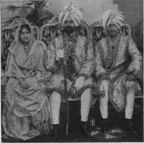 The principal personages of an important Indian wedding: H. H. the Maharajah of Kapurthala (centre), with Prince Tikka (the bridegroom) and Princess Brinda of Jubbal (the bride)