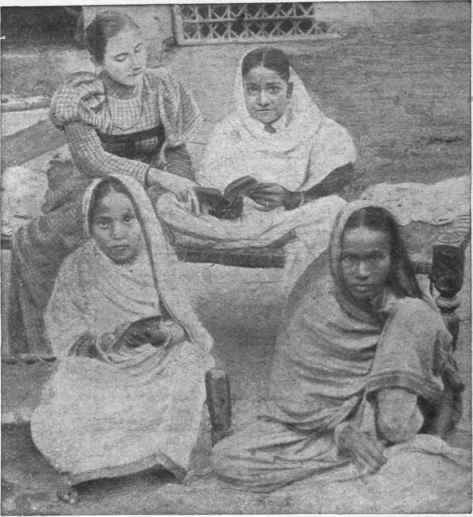 Two women working quilts of native design, Bhagalpur