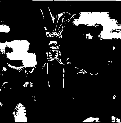 A Kure king wearing his crown and surrounded by his subjects. Amongst these pagans the terrible belief in witchcraft, with all its attendant horrors, still flourishes