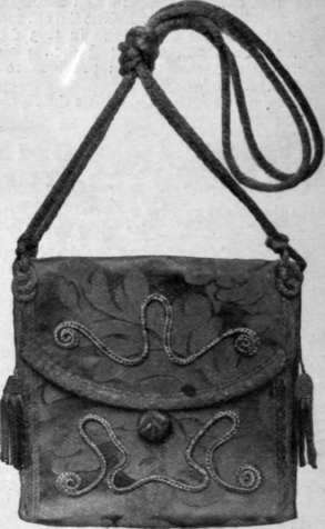 A satchel bag bound with gold furniture galon. It is intended for evening use, and can be made quite easily by home workers