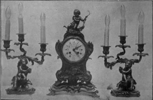 Clock and candelabra in French gilt bronze