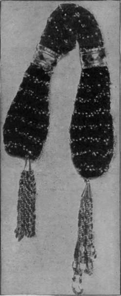 Fig. 1. A bead purse of green silk and steel beads, executed in crochet work. Such a design is admirably suitable for a bridge purse